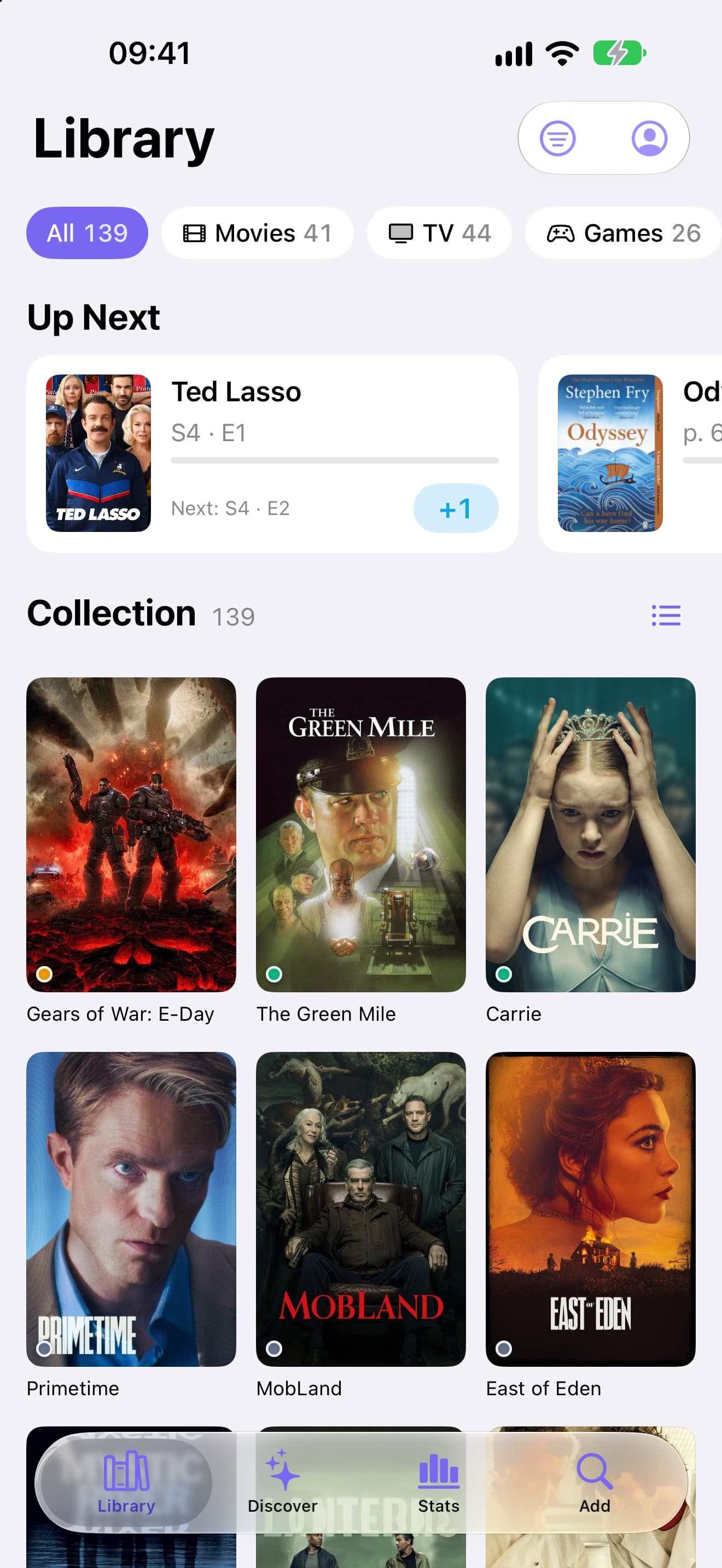 The Backlog iPhone app showing the Library tab with Up Next and a poster grid